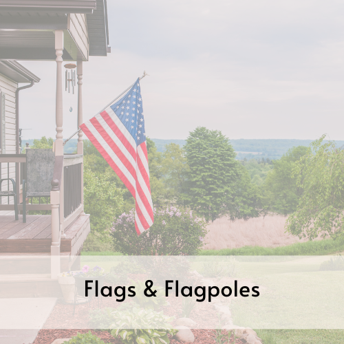 American flag mounted on front porch railing.