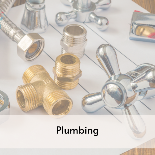 Various metal plumbing fittings, faucet handles, and tubes. 