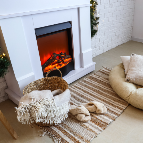 Image of an electric fireplace with a white wood surround illustrating a potential DIY home upgrade to the reader. 