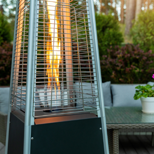 Pyramid-style outdoor patio heater with visible flame.